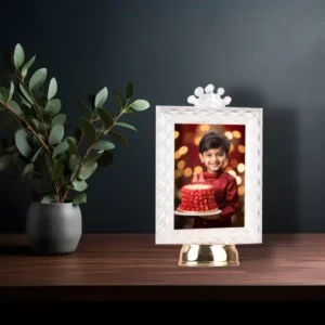 cute little photo frame in which there is a boy image with flower pot in the back- best online photo frame for loved ones