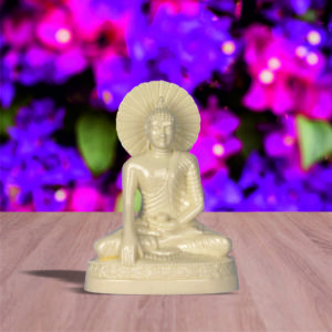 lord buddha image sitting on a wooden table with lighting background